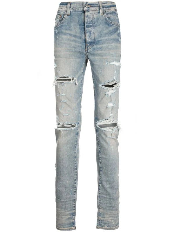 Amiri Ripped Light Wash Jeans